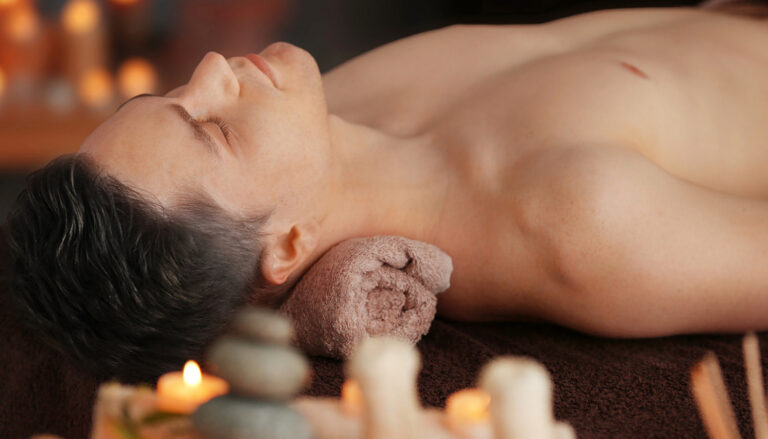 Man relaxing in spa salon